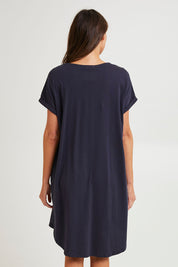 Model Madeline wearing size 10 of the Maxine Australian Cotton Tin colourShirt Dress - Coal (Black), from the back