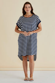 A model wearing the Maxine Australian Cotton Tin colourShirt Dress - Navystripe (Blue), from the front, showing the whole outfit