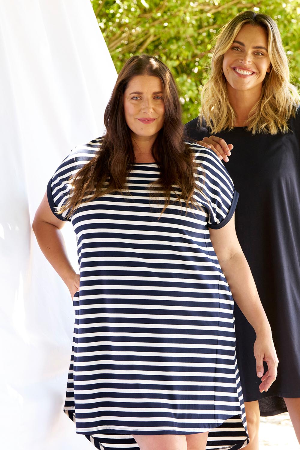 A model wearing the Maxine Australian Cotton Tin colourShirt Dress - Navystripe (Blue), from the front, showing the whole outfit
