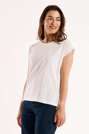 A model wearing the Michaela Australian Cotton Top in colour White (White), from the front, cropped image