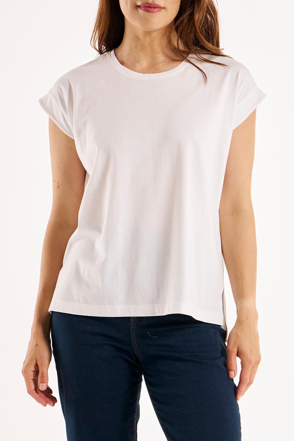 A model wearing the Michaela Australian Cotton Top in colour White (White), from the front, cropped image