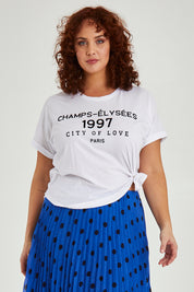 Model Maddy wearing size 16 of the Avril Print Tee in colour White (White), from the front, cropped image