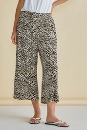 A model wearing the Crystal Bamboo Crop Jogger in colour Cheetah, from the front, cropped image