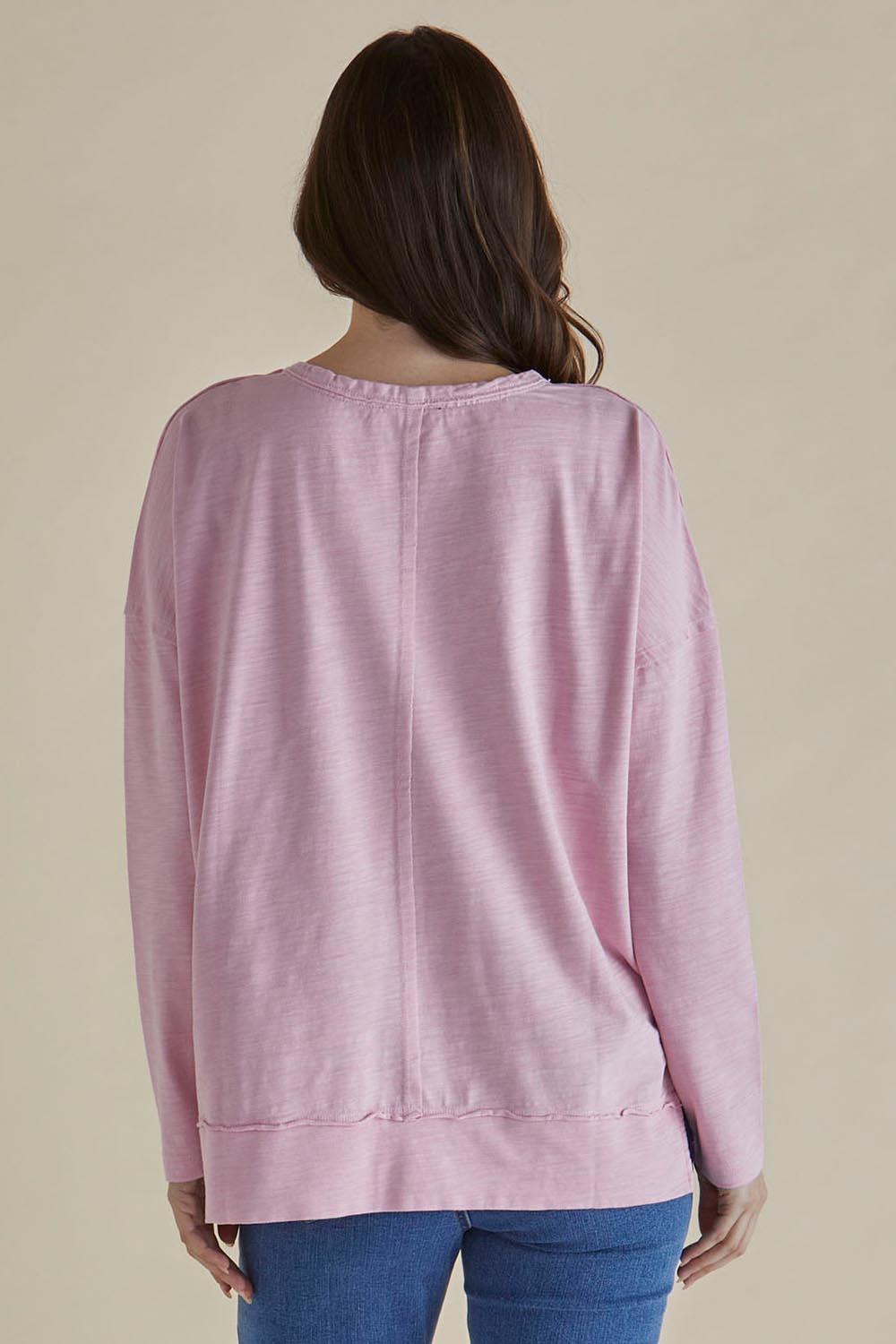 A model wearing the Roxette Cotton Tee in colour Pink (Pink), from the back
