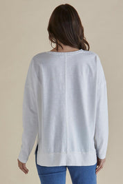 A model wearing the Roxette Cotton Tee in colour White (White), from the back