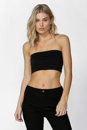 A model wearing the Cherry Boob Tube in colour Black (Black), from the front, cropped image