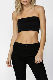 A model wearing the Cherry Boob Tube in colour Black (Black), from the front, cropped image