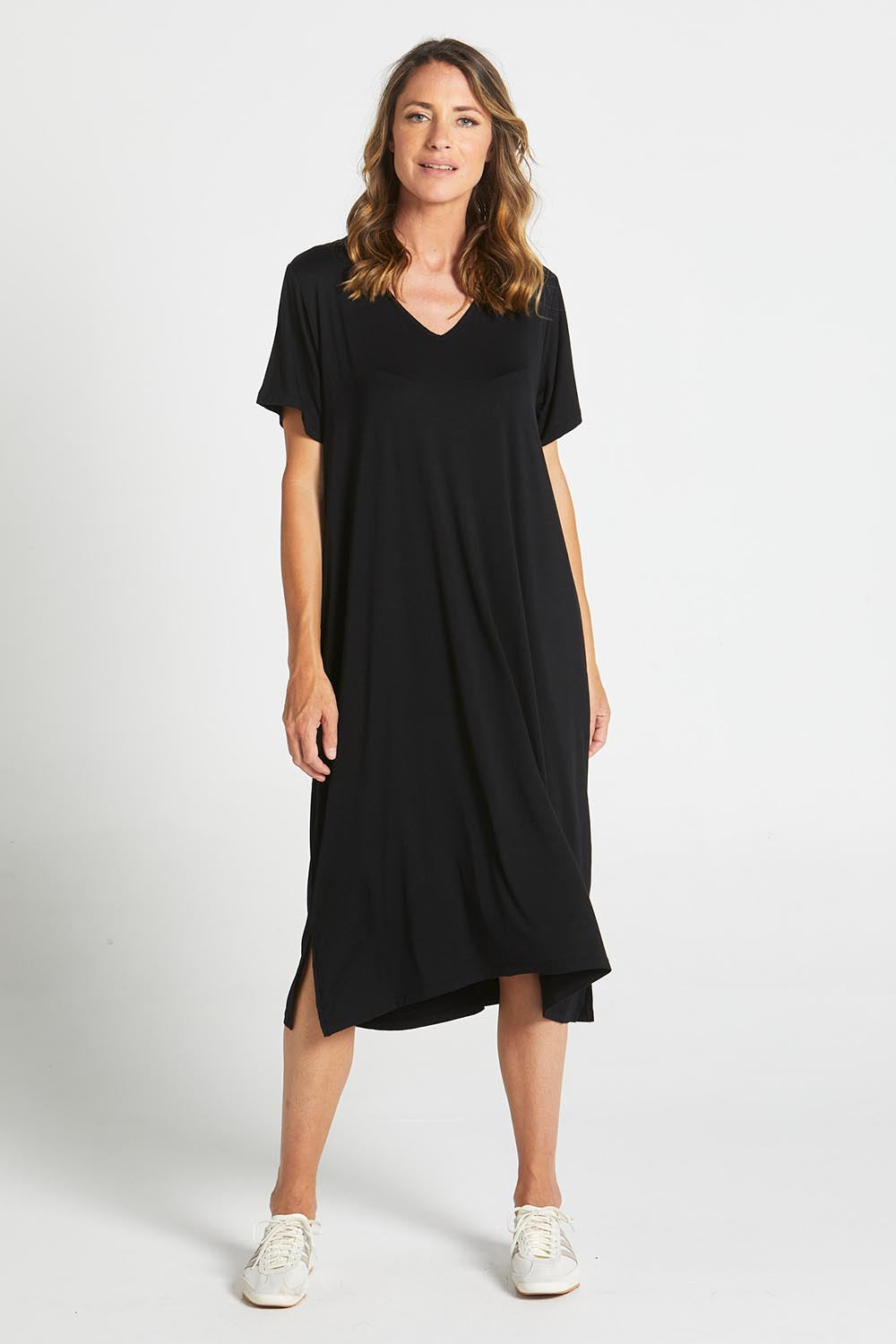 A model wearing the Irena Bamboo Tin colourShirt Dress - Black (Black), from the front, showing the whole outfit
