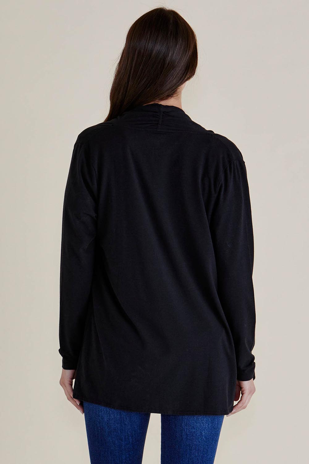 A model wearing the Maeve Bamboo Cardigan in colour Black (Black), from the back