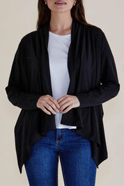 A model wearing the Maeve Bamboo Cardigan in colour Black (Black), from the front, cropped image