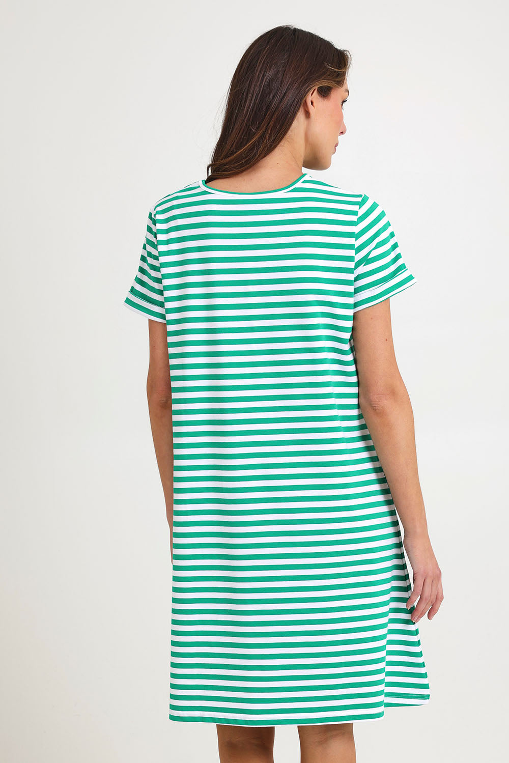 Model Madeline wearing size 10 of the Rue Cotton Dress in colour Green (Green), from the back