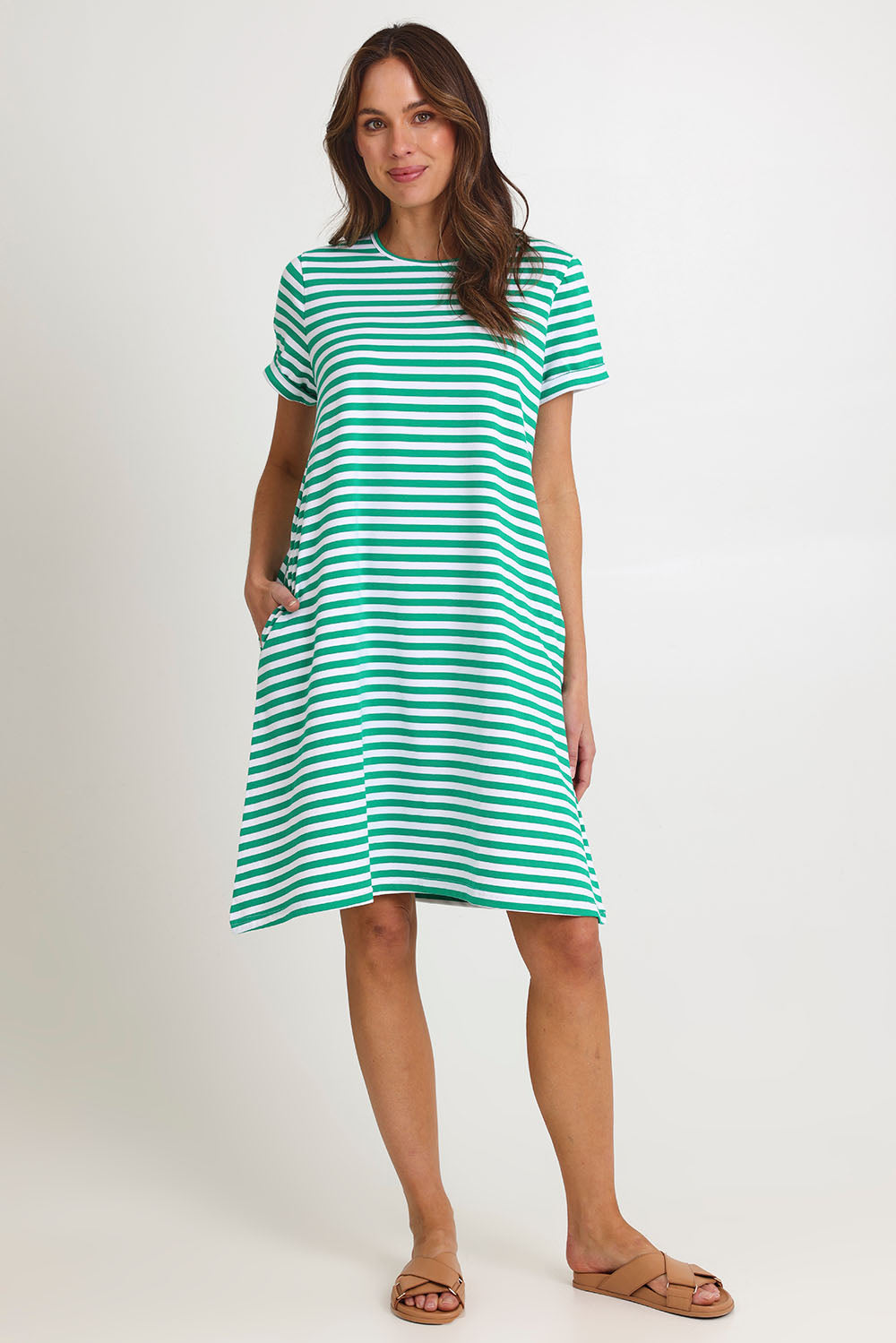 Model Madeline wearing size 10 of the Rue Cotton Dress in colour Green (Green), from the front, showing the whole outfit