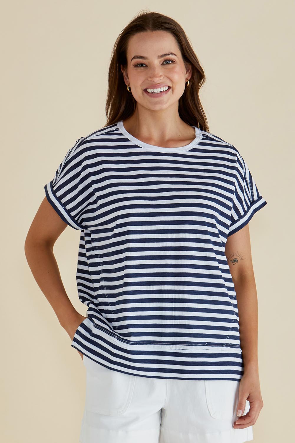 A model wearing the Shirley Cotton Short Sleeve Tee in colour Navystripe (Blue), from the front, cropped image