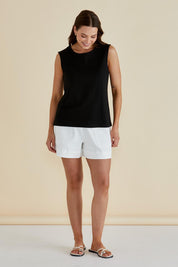 A model wearing the Jordyn Cotton Tank in colour Black (Black), from the front, showing the whole outfit