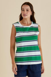A model wearing the Jordyn Cotton Tank in colour Green (Green), from the front, cropped image