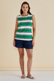 A model wearing the Jordyn Cotton Tank in colour Green (Green), from the front, showing the whole outfit