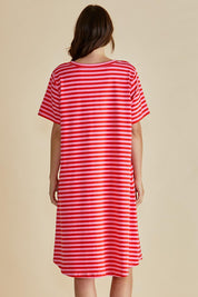 A model wearing the Eloise Cotton Tin colourShirt Dress - Pinkred (Red), from the back