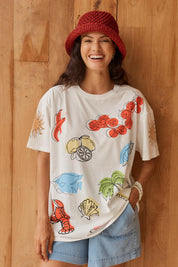 Model Genericm wearing size sample of the Weekend Tee – Harvest in colour Harvest, in a cropped view