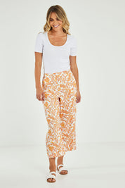 Model Alice wearing size 10 of the Stacey Rib Tee in colour White (White), from the front, showing the whole outfit