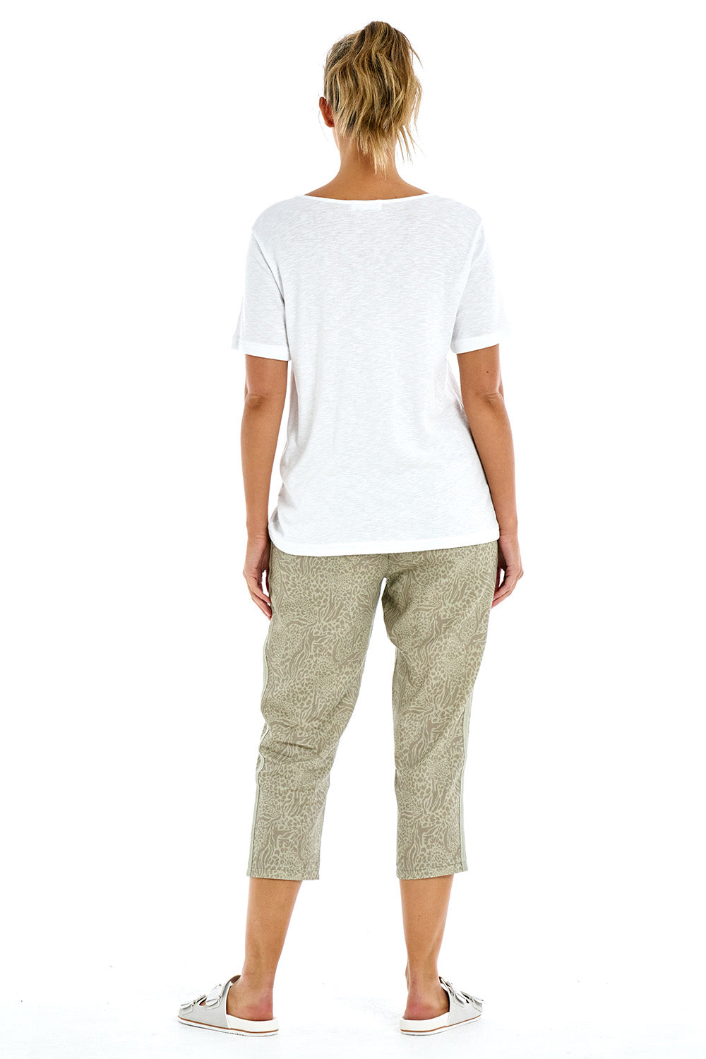 A model wearing the Burleigh Tee in colour White (White), from the back
