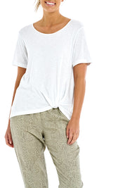 A model wearing the Burleigh Tee in colour White (White), from the front, cropped image