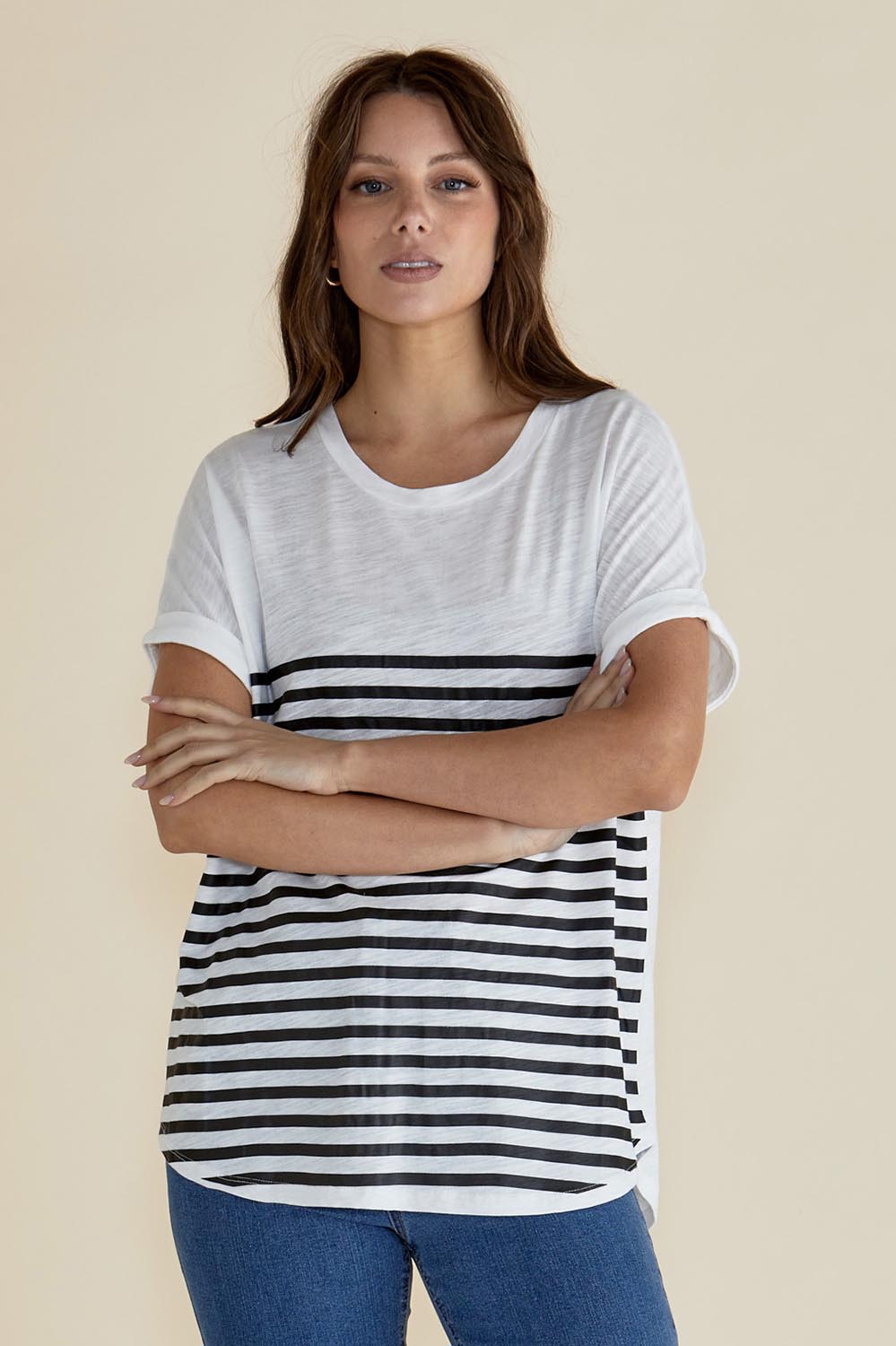 A model wearing the Hailey Short Sleeve Cotton Tee in colour Blkstripe (White), from the front, cropped image