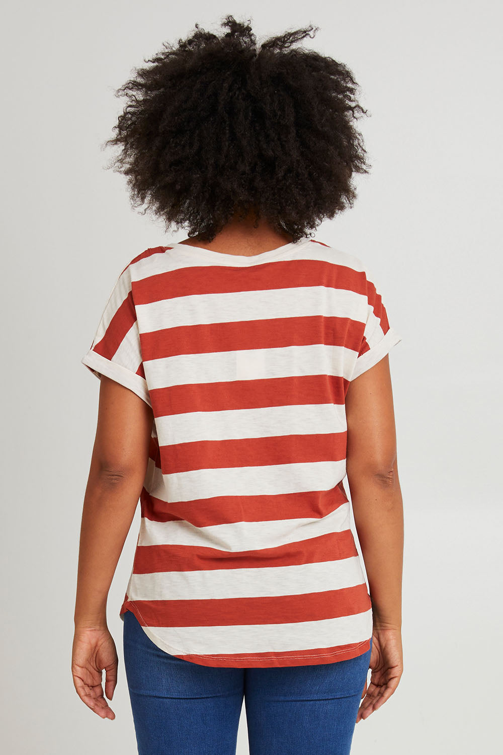 Model Olivia wearing size 10 of the Hailey Short Sleeve Tee in colour Terracotta, from the back