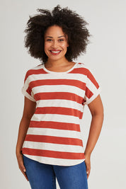 Model Olivia wearing size 10 of the Hailey Short Sleeve Tee in colour Terracotta, from the front, cropped image