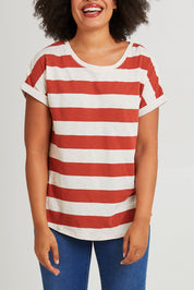 Model Olivia wearing size 10 of the Hailey Short Sleeve Tee in colour Terracotta, from the front, cropped image