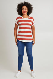 Model Olivia wearing size 10 of the Hailey Short Sleeve Tee in colour Terracotta, from the front, showing the whole outfit