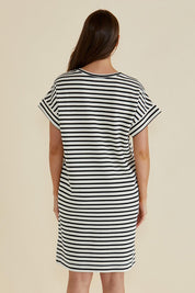 A model wearing the Elise V Neck Cotton Rib Dress in colour Whiteblk, from the back