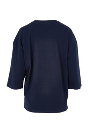 Product shot of the Raven Cotton Top in colour Navy (Blue), from the back