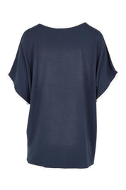 Product shot of the Clara Tee in colour Petrol (Blue), from the back