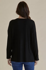 A model wearing the Hendrix Ribbed Long Sleeve Tee in colour Black (Black), from the back