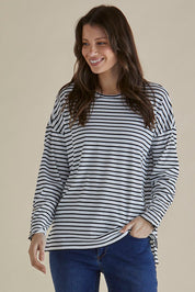 A model wearing the Hendrix Ribbed Long Sleeve Tee in colour Stripe (White), from the front, cropped image