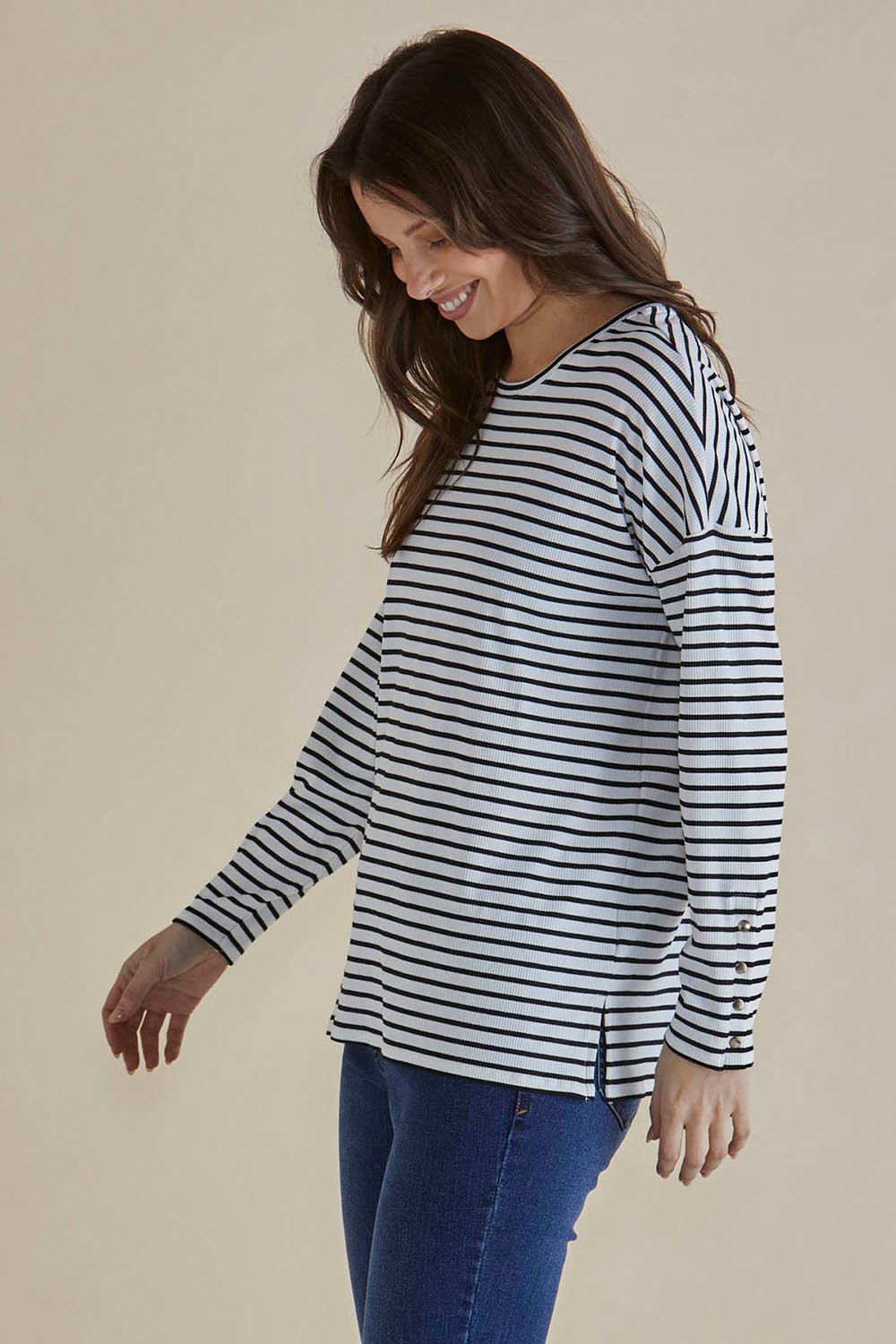 A model wearing the Hendrix Ribbed Long Sleeve Tee in colour Stripe (White), from the front, cropped image