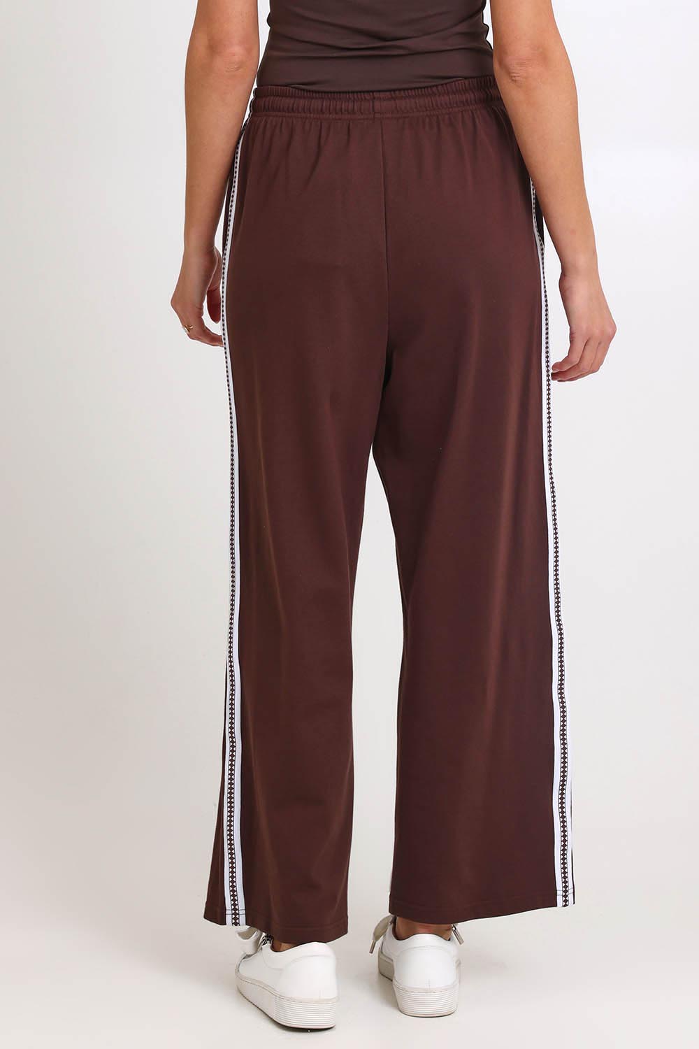 Model Madelinec wearing size 10 of the Nikki Relax Cotton Jogger – Chocolate in colour Chocolate, from the back