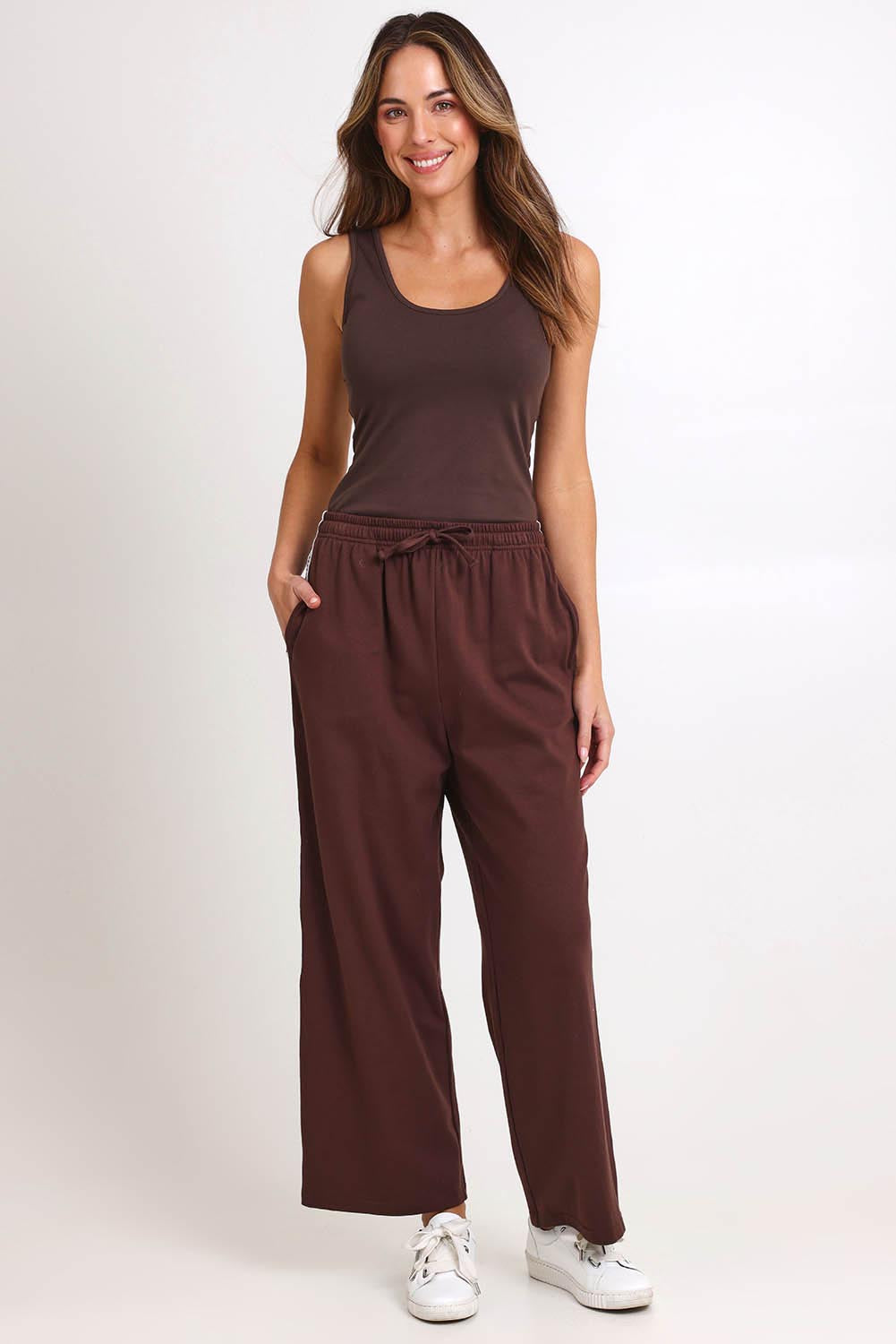 Model Madelinec wearing size 10 of the Nikki Relax Cotton Jogger – Chocolate in colour Chocolate, from the front
