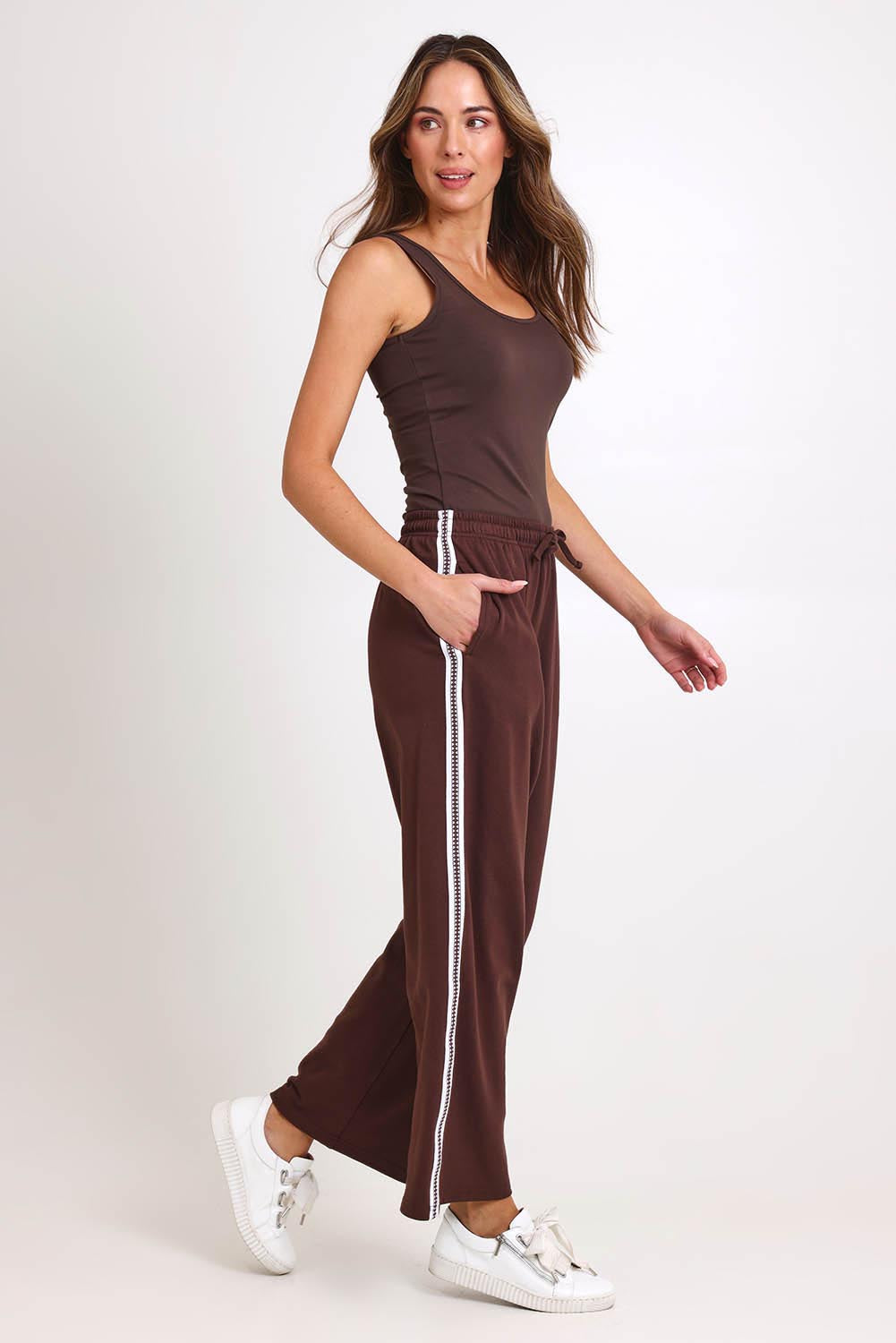 Model Madelinec wearing size 10 of the Nikki Relax Cotton Jogger – Chocolate in colour Chocolate, from the front