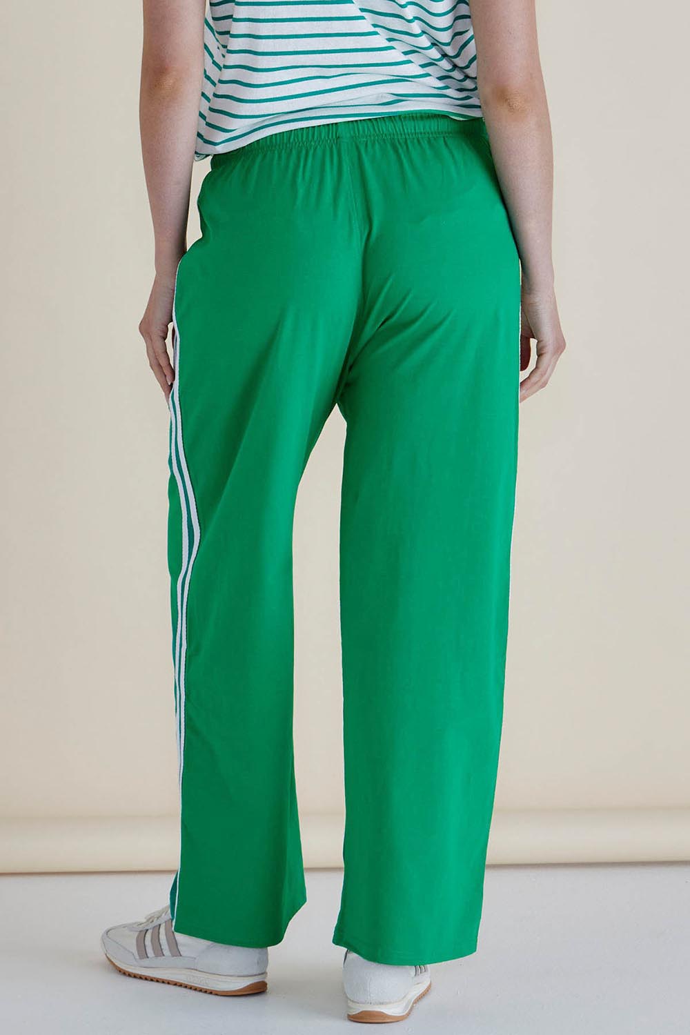 A model wearing the Nikki Relax Cotton Jogger in colour Green (Green), from the back