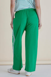 A model wearing the Nikki Relax Cotton Jogger in colour Green (Green), from the back