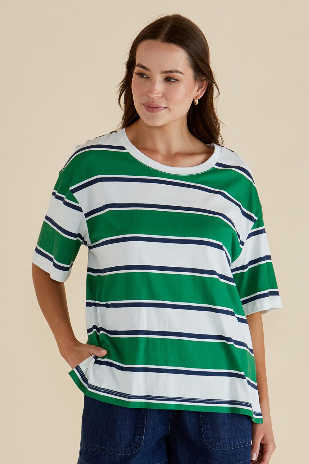 A model wearing the Relax Boxy Cotton Tee in colour Green (Green), from the front, cropped image