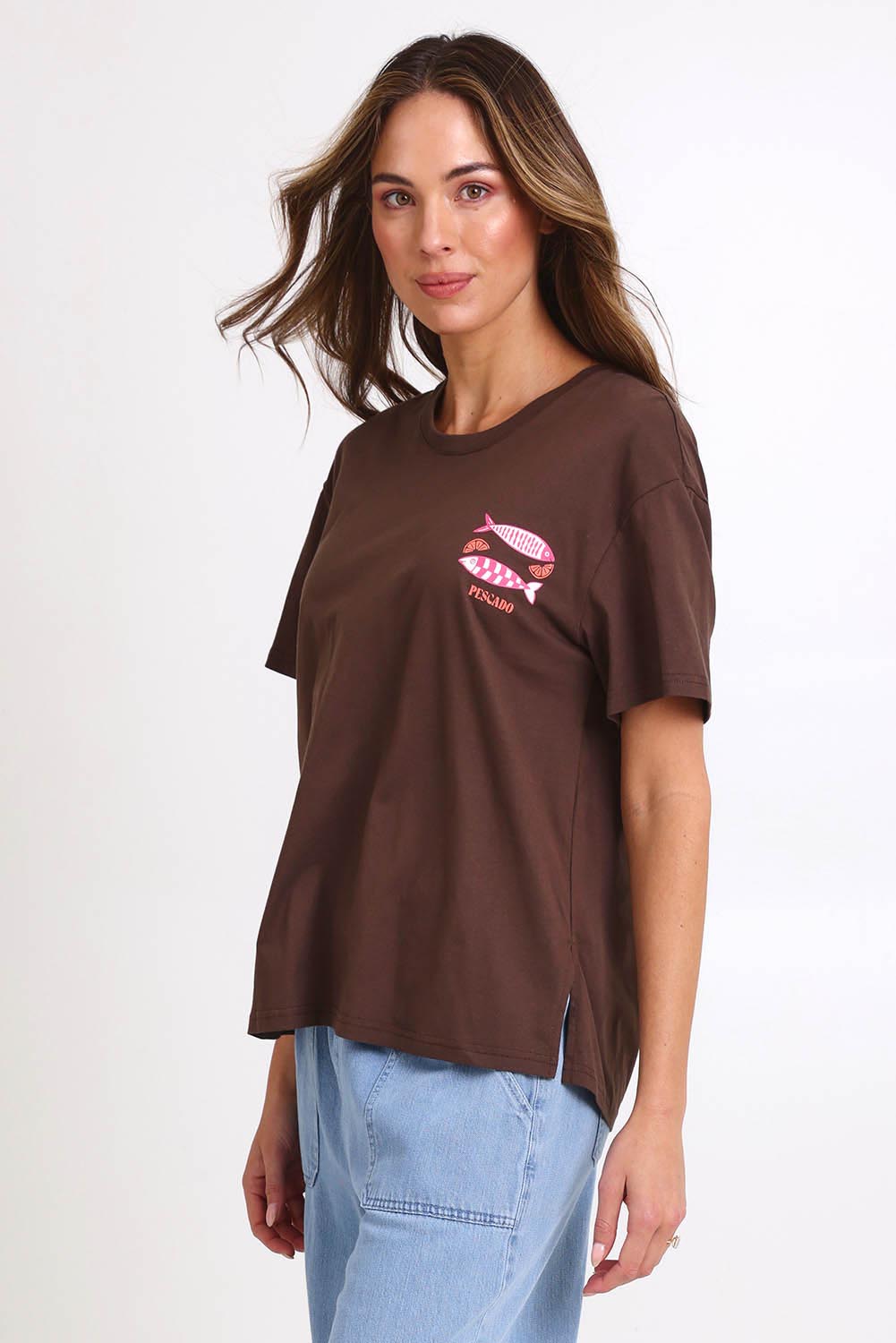 Model Madelinec wearing size 10 of the Relax Boxy Tee – Pescado in colour Pescado, from an angle