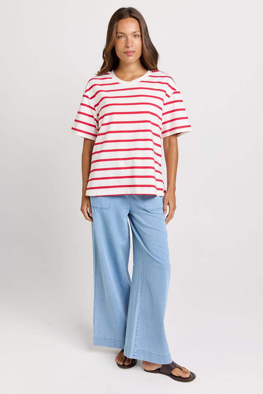 Model Genericm wearing size sample of the Relax Boxy Tee – Redwhite in colour Redwhite, from the front