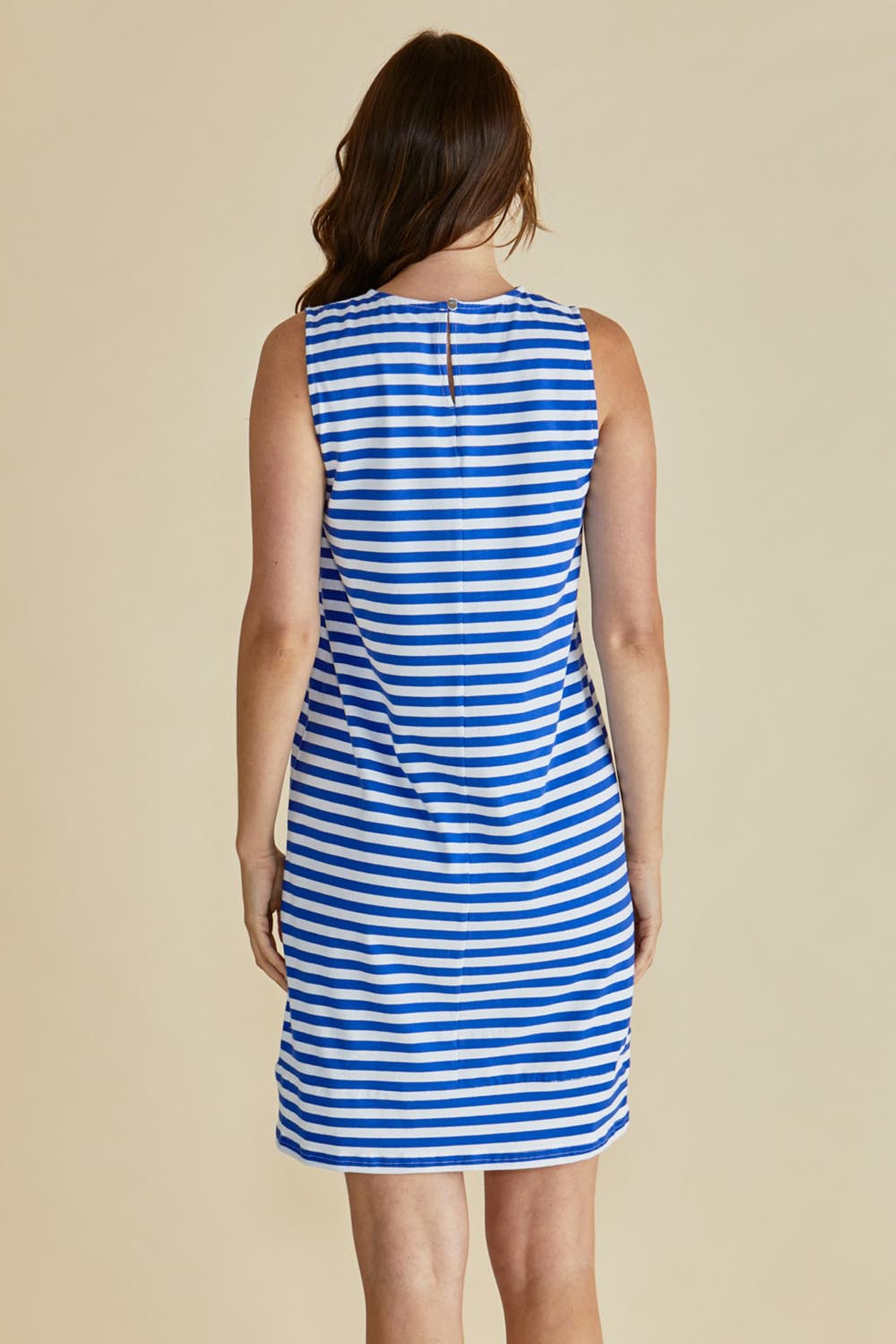 A model wearing the Tia Cotton Tank Dress in colour Royalblue (Blue), from the back
