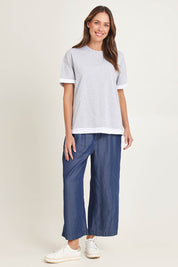 Model Madeline wearing size 10 of the Cotton Boyfriend Tee in colour Greymarle (Grey), from the front, showing the whole outfit