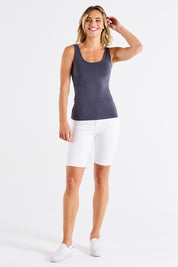 A model wearing the Emma Cotton Scoop Tank in colour Steel (Grey), from the front, showing the whole outfit