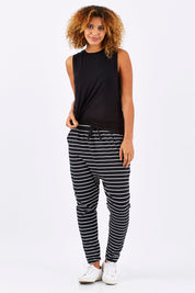Model Summer wearing size 10 of the Jade Pant in colour BlackWhite (Black), from the front, showing the whole outfit