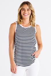 A model wearing the Keira Cotton Tank in colour Navystrpnk (Blue), from the front, cropped image