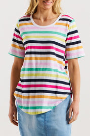 A model wearing the Ariana Cotton Tee in colour Rainbow, from the front, cropped image